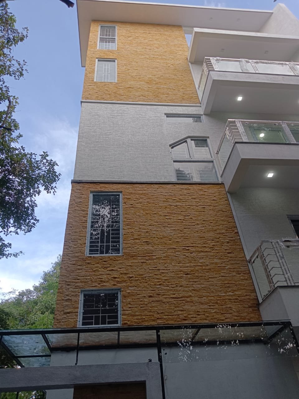 Two-Tone Gold & White Facade
